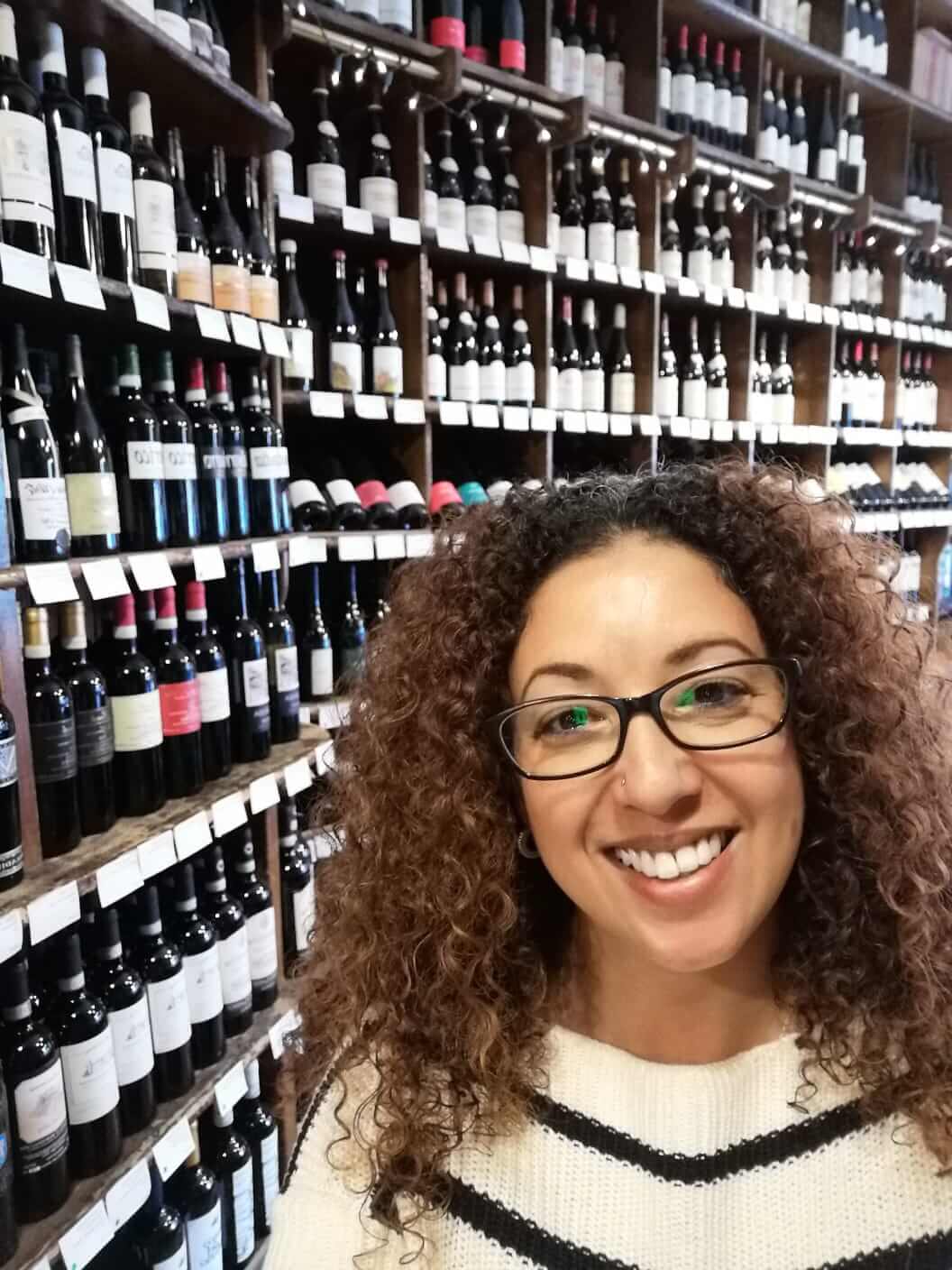 Natalie Sippers & spitters in wine shop